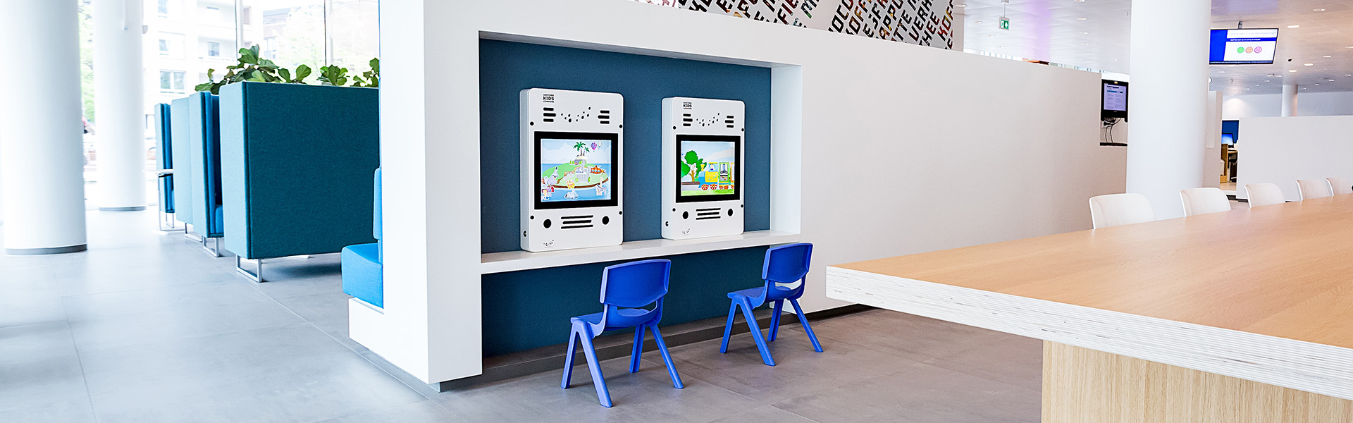 this image shows a kids corner with interactive play system this image shows a kids corner with interactive play system